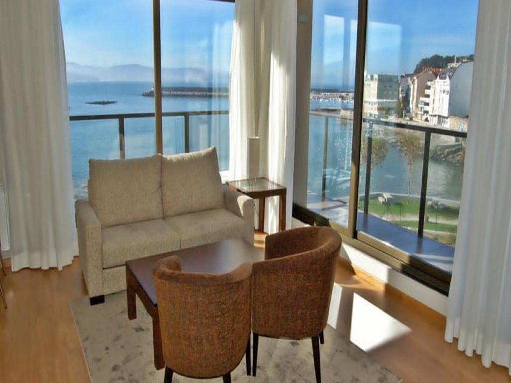 Apartamentos Turisticos Playa De Osmo Corme المظهر الخارجي الصورة